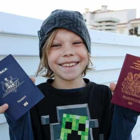 My son holding his two passports