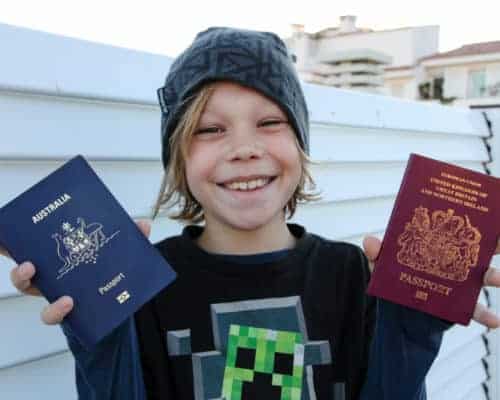 My son holding his two passports