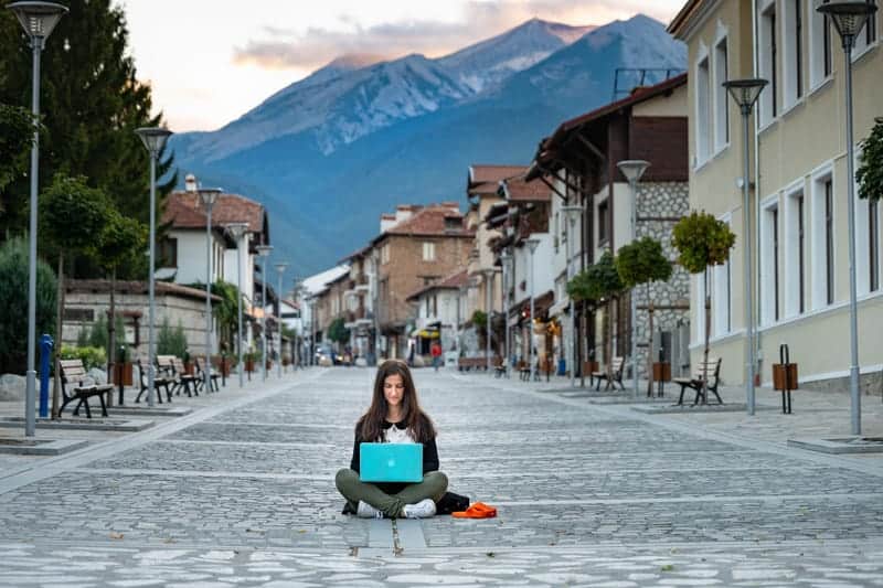 A digital nomad working on her laptop in costa rica