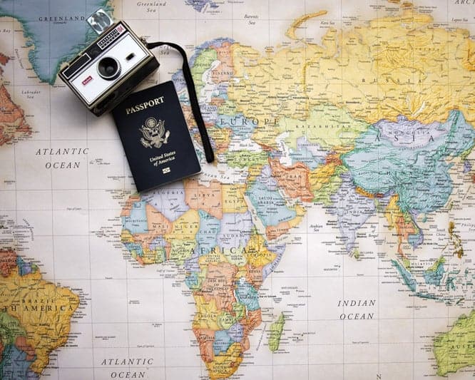 Passport on a map of the world