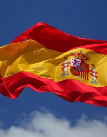 A Spanish flag, symbol of Spanish citizenship and passport.
