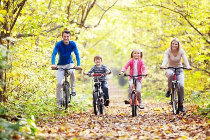 A family on bicycles enjoying life in Europe