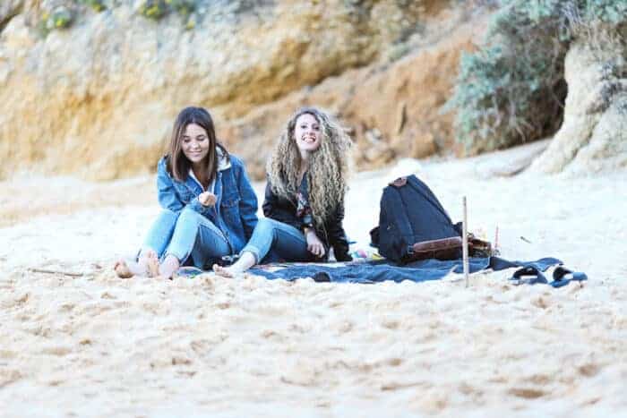 Girls on the beach in the Algarve in Portugal.