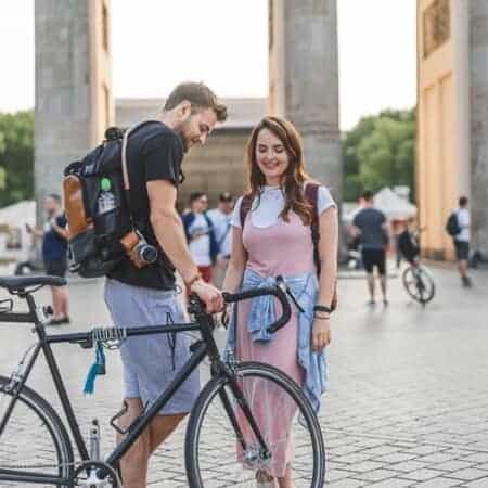 two people in Berlin on their bicycles with Germany visas