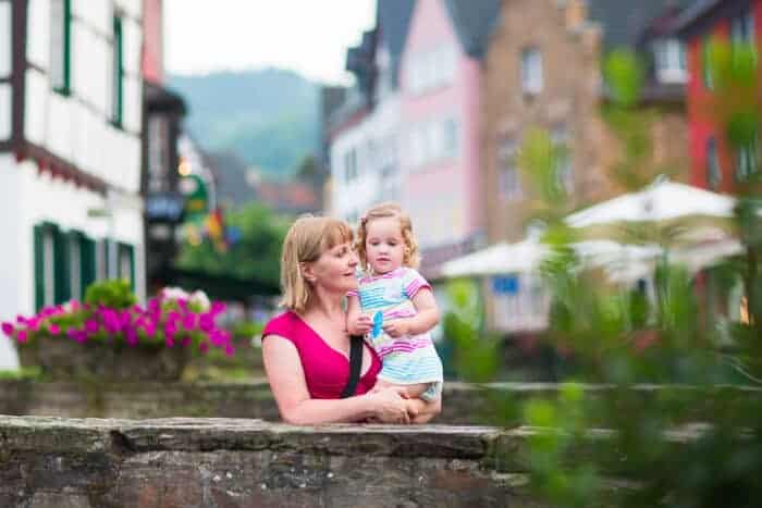 Woman and her daughter on a bridget in Germany