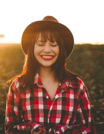 A girl in a field living in Portugal