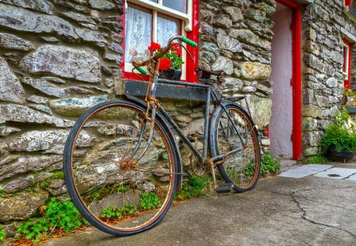 A Bicycle leaning against an old building in Ireland