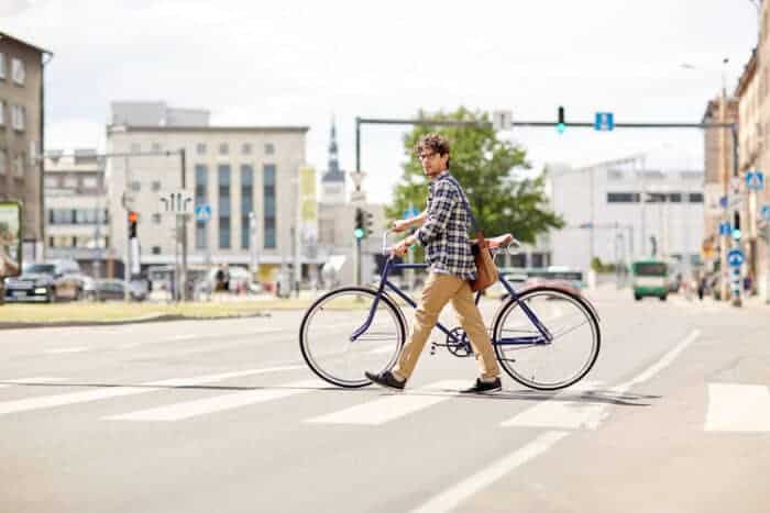 Man crossing a street in Tallinn, Estonia