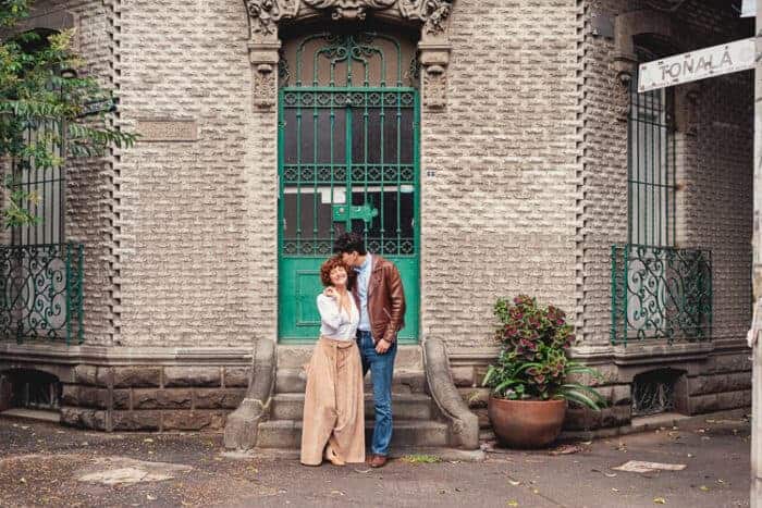 A couple outside their house in Mexico