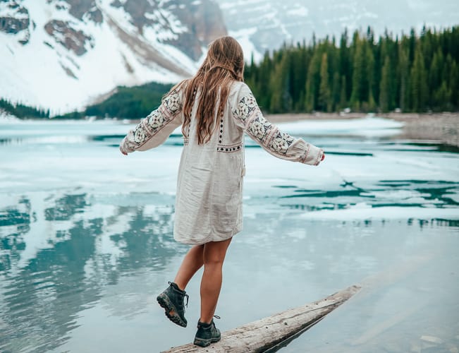 Girl living in Canada and walking along a lake