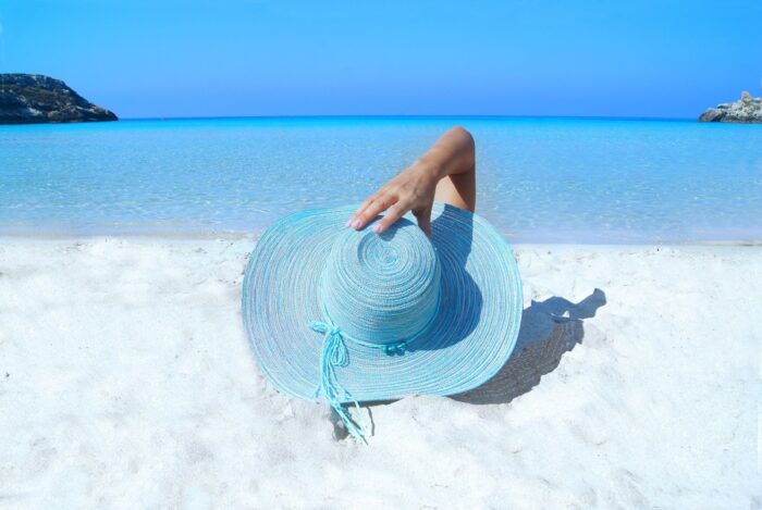 Young woman on beach Living in Greece
