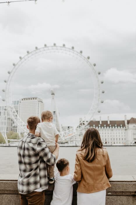A family who are living in the UK and are looking at London skyline