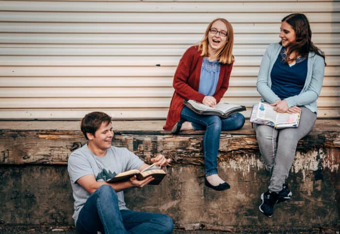 Students in Australia chatting and reading books