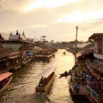 A water Market in Thailand at sunset