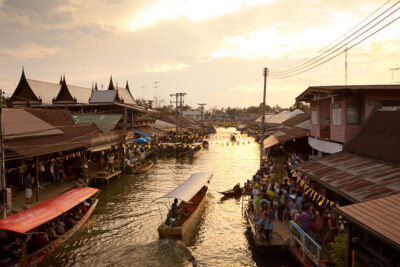 A water Market in Thailand at sunset