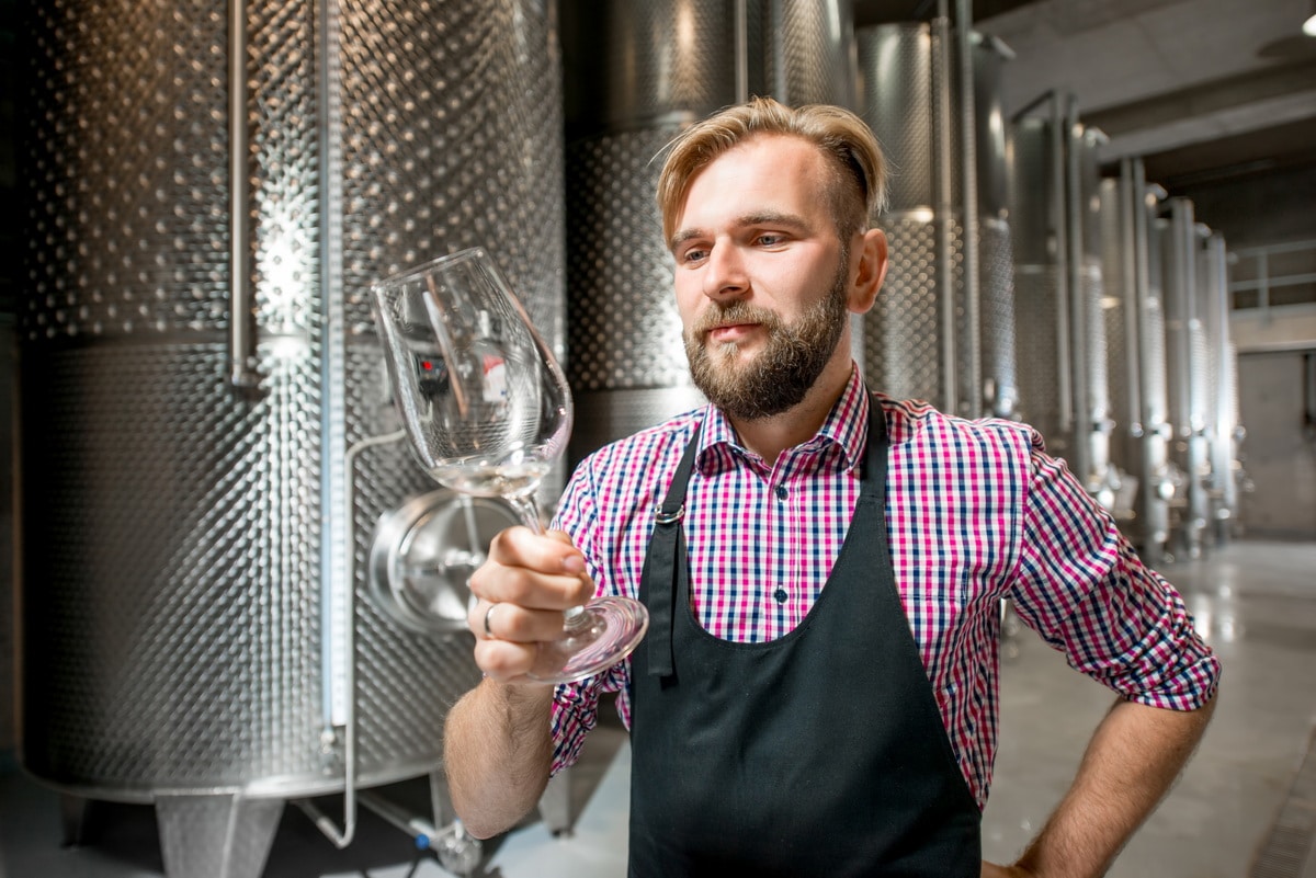 A winemaker working abroad on a skills visa